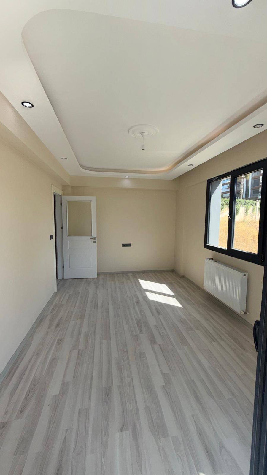 ERGENEKON MAHALLESİ 3+1 OTOPARK ÜSTÜ GENİŞ FERAH KİRALIK DAİRE