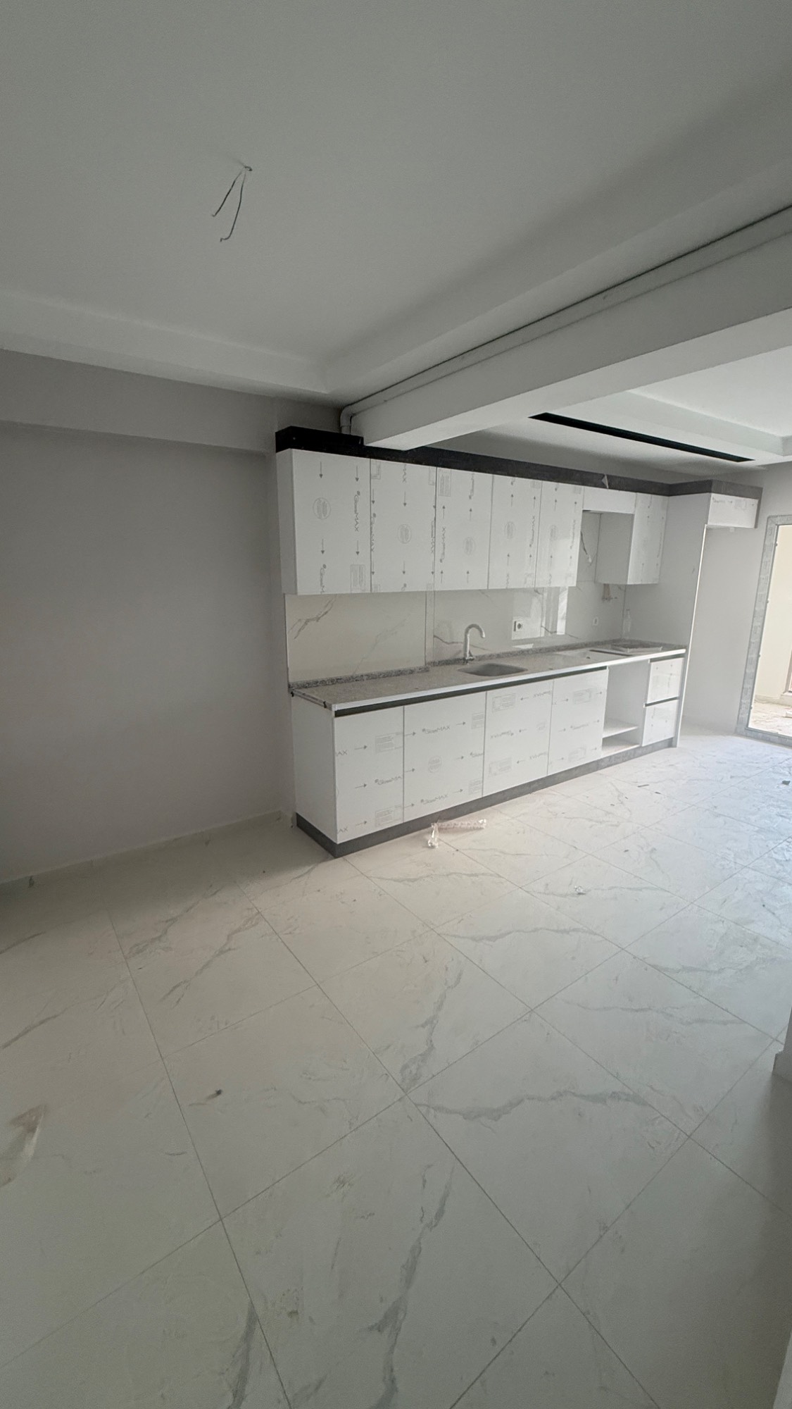 BAYRAM YERİ YAKINI GENİŞ ARA KAT YERDEN ISITMALI ACİL SATILIK DAİRE